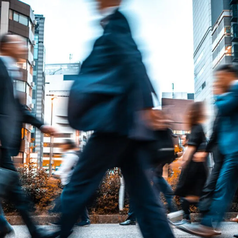 businessman walking in city