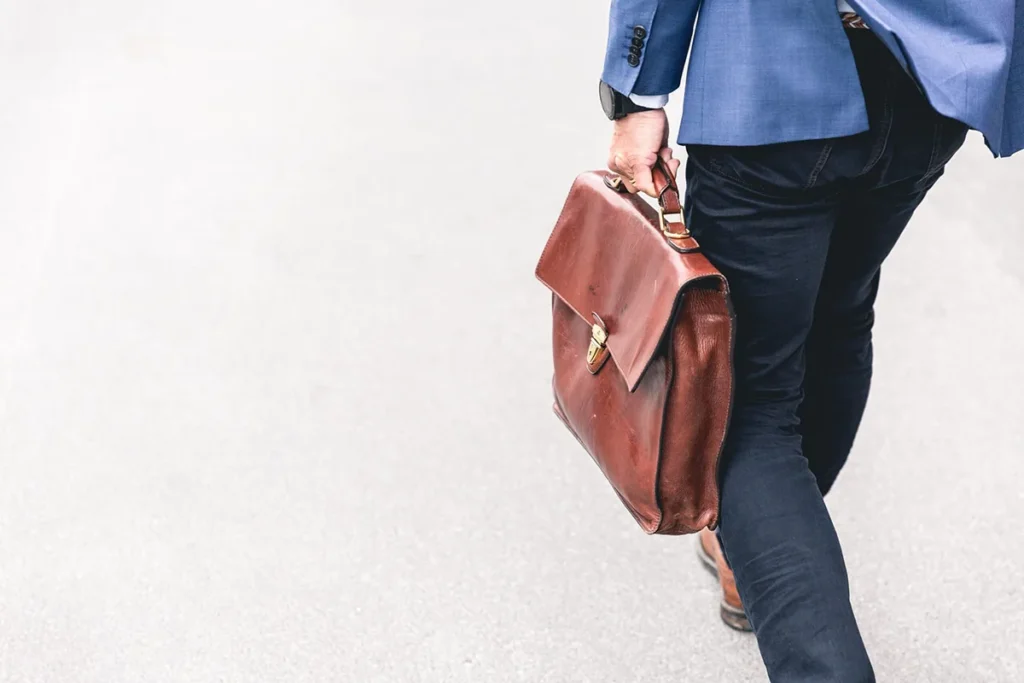 man carrying briefcase