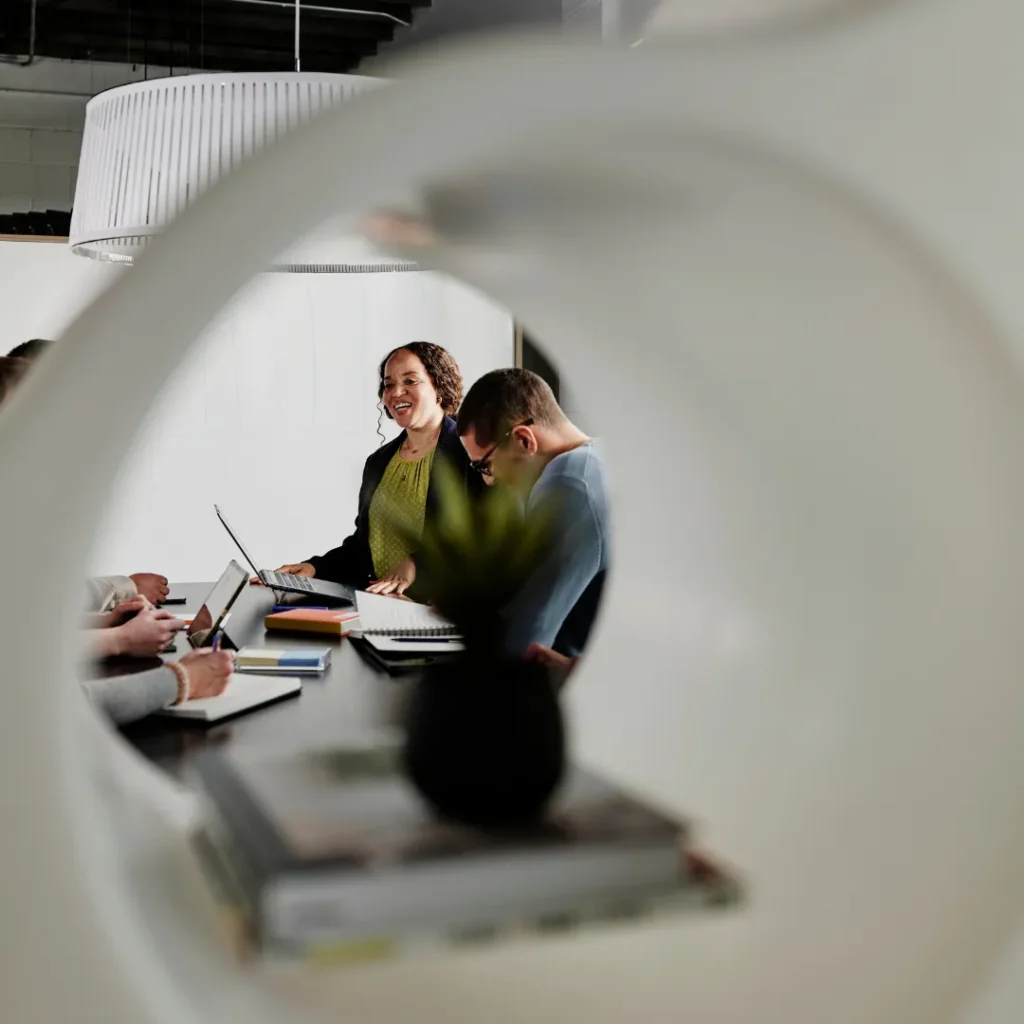 Colleagues work together in a conference room