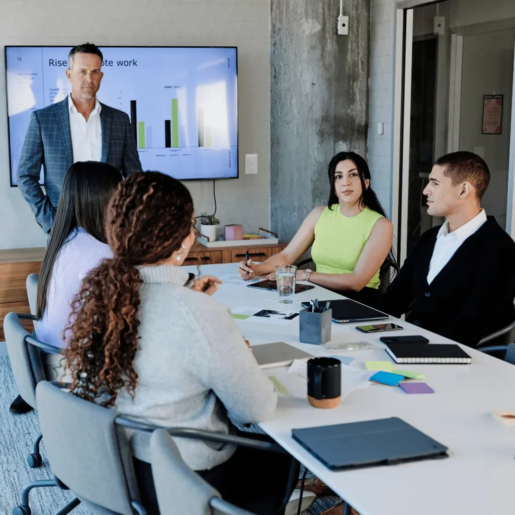 Manager presents a deck in an office conference room