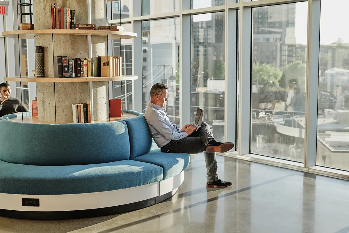 man working from high rise