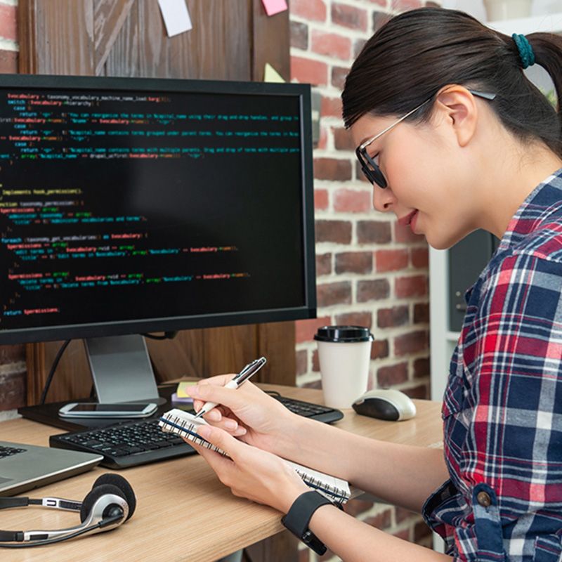 Woman working on code